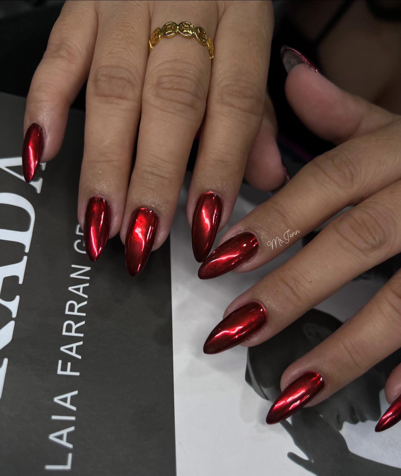 Red nail design by Ms. Jenn