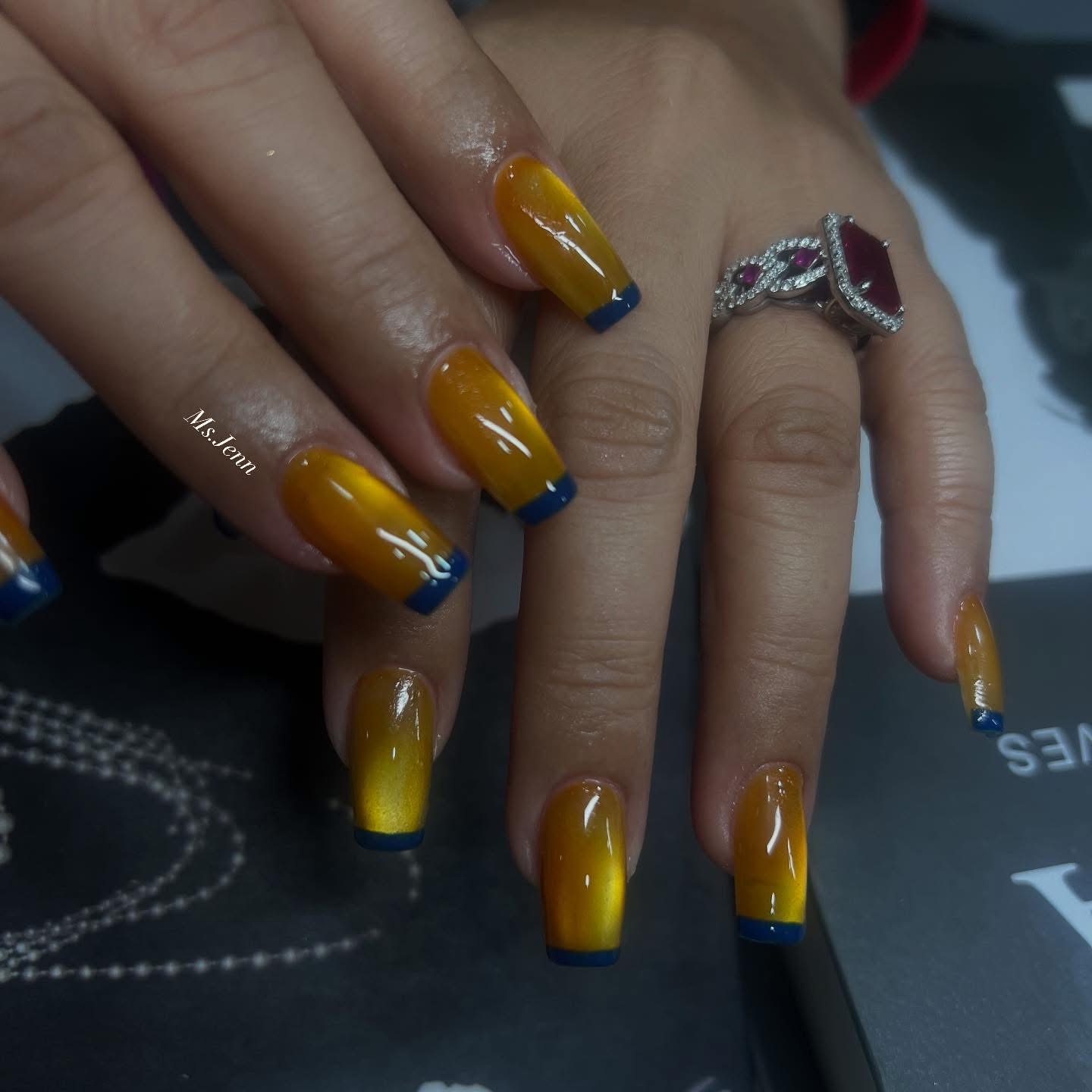 Yellow nail design by Ms. Jenn